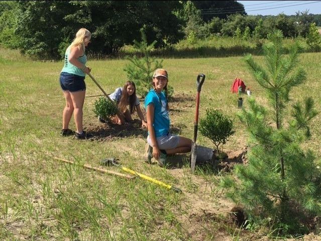 Girls Planting Trees at the Kudner Property